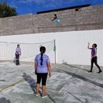 girls playing volleyball